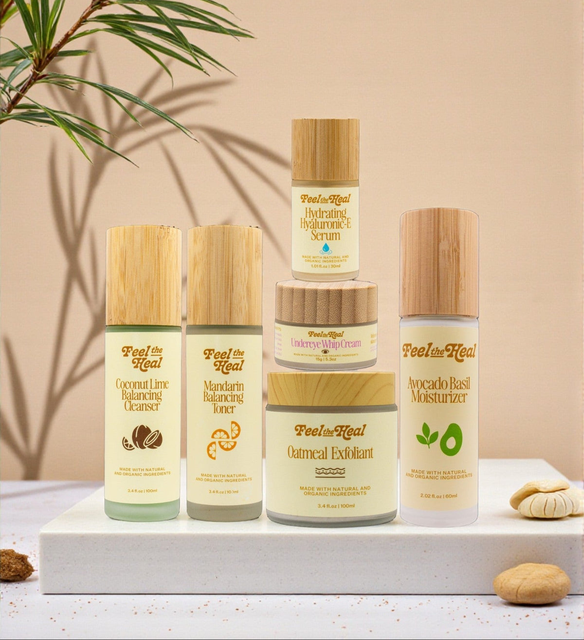 Collection of Feels Real skincare products with natural elements on a beige background